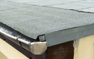 repair or replace Caersws flat roofing?